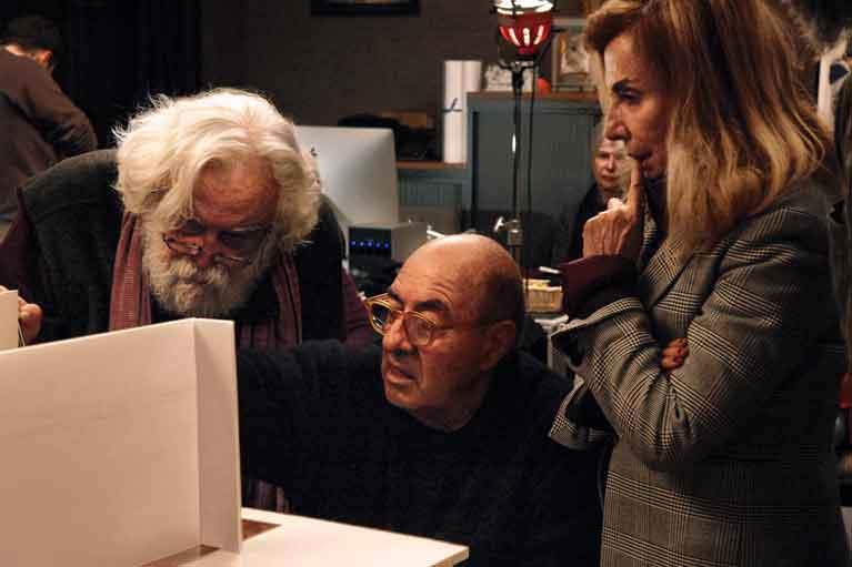 A scale model of “The Living Tableau” set is examined by creator Acosta, legendary production designer Dante Ferretti and his wife and collaborator, storied set designer Francesca Lo Schiavo, both winners of three Academy Awards<sup>®</sup>. <span style=""font-size: 9px;"">© AFA vzw</span>